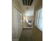 The hallway is well lit with lots of closet space and bright natural lighting at 9801 Bradford Summit St, Las Vegas, NV 89183