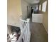 Hallway with railing and lots of natural light at 9801 Bradford Summit St, Las Vegas, NV 89183