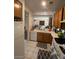 Functional kitchen with tile flooring and essential appliances for everyday cooking at 9801 Bradford Summit St, Las Vegas, NV 89183
