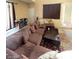Spacious living room with comfortable seating and a high ceiling at 9801 Bradford Summit St, Las Vegas, NV 89183