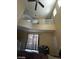 Living room with stairs, lots of light and comfortable seating at 9801 Bradford Summit St, Las Vegas, NV 89183