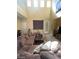 Spacious living room with high ceilings and abundant natural light at 9801 Bradford Summit St, Las Vegas, NV 89183