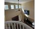 View of a vaulted ceiling living room from above, showcasing the spacious design and natural light at 9801 Bradford Summit St, Las Vegas, NV 89183