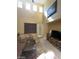 Bright living room with high ceilings and abundant natural light at 9801 Bradford Summit St, Las Vegas, NV 89183