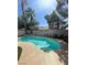 A beautiful backyard with a luxurious inground swimming pool at 9801 Bradford Summit St, Las Vegas, NV 89183