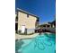 Inviting backyard pool with sun loungers, and privacy fence, perfect for relaxation at 9801 Bradford Summit St, Las Vegas, NV 89183