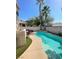 Desert home with a sparkling inground swimming pool in backyard at 9801 Bradford Summit St, Las Vegas, NV 89183