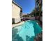 Lush backyard features a sparkling pool, perfect for summer fun at 9801 Bradford Summit St, Las Vegas, NV 89183