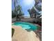 Sparkling backyard pool with landscaping and spa at 9801 Bradford Summit St, Las Vegas, NV 89183