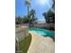 Backyard pool with palm trees at 9801 Bradford Summit St, Las Vegas, NV 89183