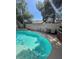 View of a sparkling backyard pool with surrounding lounge area at 9801 Bradford Summit St, Las Vegas, NV 89183