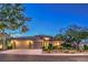 Beautiful single-story home with mature landscaping, a three-car garage, and a neutral stucco exterior at 10300 Wellside Hill Ave, Las Vegas, NV 89145