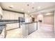 Stylish kitchen features granite countertops and a breakfast bar at 10300 Wellside Hill Ave, Las Vegas, NV 89145