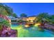Amazing backyard with custom pool and lush landscaping at 10300 Wellside Hill Ave, Las Vegas, NV 89145