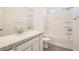 Bright bathroom with a single sink vanity, quartz countertop, and a shower-tub combination at 105 Barkset Way, Henderson, NV 89011