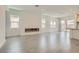 Bright and airy living space with tile flooring, a fireplace, recessed lighting, and plenty of natural light at 107 Barkset Way, Henderson, NV 89011