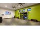 Well-equipped fitness room with weights, medicine balls, and mounted screens for fitness enthusiasts at 11289 Vision Peak Ave # 103, Las Vegas, NV 89135