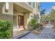 Inviting townhome entrance with contemporary design and well-maintained landscaping at 11289 Vision Peak Ave # 103, Las Vegas, NV 89135