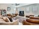 Cozy living room with modern furnishings, decorative accents, and tiled flooring at 11289 Vision Peak Ave # 103, Las Vegas, NV 89135