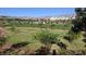Picturesque park with walking paths, grassy fields, trees, and mountain views, perfect for outdoor activities at 11289 Vision Peak Ave # 103, Las Vegas, NV 89135