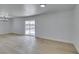 Bright living room with sliding glass doors and light wood flooring at 1225 Arrowhead Ave, Las Vegas, NV 89106