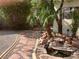 Inviting backyard showcasing a serene water feature and a meticulously designed patio area at 13 Desert Dawn Ln, Henderson, NV 89074