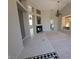 Spacious living room features a fireplace, high ceilings, and stylish lighting fixtures at 13 Desert Dawn Ln, Henderson, NV 89074