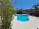 Backyard pool with concrete surround, offering a serene outdoor oasis at 13 Desert Dawn Ln, Henderson, NV 89074