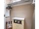 A well- organized closet includes hangers, luggage rack, safe and a shelf for additional storage at 135 E Harmon Ave # 809, Las Vegas, NV 89109