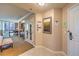 Hallway leading to the living space showcasing a kitchenette, dining, and sitting area at 135 E Harmon Ave # 809, Las Vegas, NV 89109
