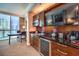 Convenient kitchenette with modern appliances and storage next to a sunny dining nook at 135 E Harmon Ave # 809, Las Vegas, NV 89109