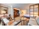 Open-concept living area with kitchenette, seating, dining area, and king sized bed at 135 E Harmon Ave # 809, Las Vegas, NV 89109
