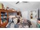 Bedroom with decorated headboard and floral bedding at 145 Langley Hill Ave, Henderson, NV 89002