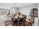 Stylish dining area featuring modern decor, seating for four, and access to outdoor spaces at 145 Langley Hill Ave, Henderson, NV 89002