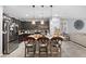 Kitchen featuring granite countertops, stainless steel appliances, a pantry, and an eat-in island at 145 Langley Hill Ave, Henderson, NV 89002