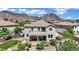 Spacious two-story home with a balcony, covered patio, and mountain views at 15 Imposing Knoll Ave, Henderson, NV 89002