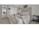 Cozy bedroom with neutral tones, plush carpeting, and a spacious closet at 15 Imposing Knoll Ave, Henderson, NV 89002