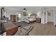 Spacious bedroom featuring wood floors, ceiling fan, and access to the ensuite bath at 15 Imposing Knoll Ave, Henderson, NV 89002