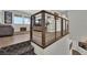 Upstairs hallway showcases modern railing and seamless flow from staircase to the living area at 15 Imposing Knoll Ave, Henderson, NV 89002