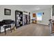 Bright living room featuring stylish decor, hardwood floors, and a cozy atmosphere at 15 Imposing Knoll Ave, Henderson, NV 89002