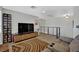 Open living area features hardwood floors and a modern media center at 15 Imposing Knoll Ave, Henderson, NV 89002