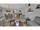 Open living space with dining area, plush seating and elegant decor throughout the home at 15 Imposing Knoll Ave, Henderson, NV 89002