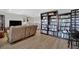 Inviting living room features hardwood floors and built-in bookshelves, creating an elegant, cozy space at 15 Imposing Knoll Ave, Henderson, NV 89002