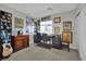 Cozy office featuring a guitar and a large collection of vinyl records at 15 Imposing Knoll Ave, Henderson, NV 89002