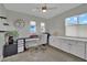 Bright office space with built-in cabinets, a modern desk, and ample natural light at 15 Imposing Knoll Ave, Henderson, NV 89002
