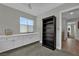 Office featuring a large window, built in cabinets, and a floor-to-ceiling bookshelf at 15 Imposing Knoll Ave, Henderson, NV 89002