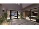 Open courtyard with elegant lighting and views of the home's interior at 1516 Pleasant Bay Ct, Henderson, NV 89011