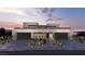 Contemporary home featuring a three-car garage and modern landscaping at 1516 Pleasant Bay Ct, Henderson, NV 89011