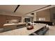 Open concept kitchen and dining area flowing into the living space at 1516 Pleasant Bay Ct, Henderson, NV 89011