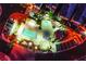 An aerial view of a pool and recreation area at night at 1557 Blue Sierra Ct, Henderson, NV 89074